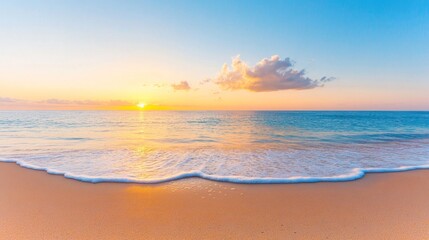 Serene beach at sunset with gentle waves and colorful sky.