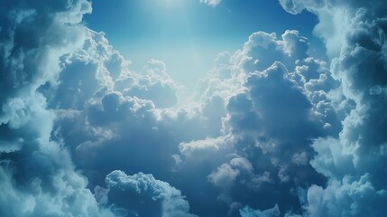 Fototapeta premium A beautiful view of soft, white clouds against a bright blue sky.