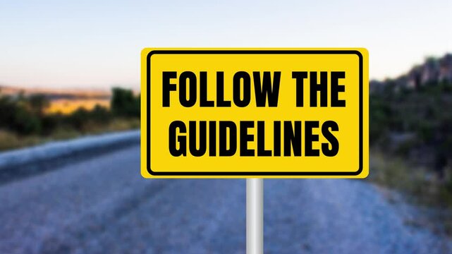 Follow the guidelines message writing on a yellow metal signpost