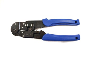 Photo of metal crimping pliers for telephone cables and computer plugs, isolated on white...