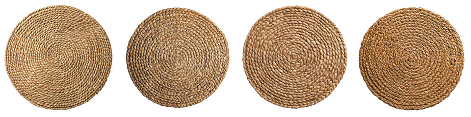 Obraz premium Set of Intricately Woven Rattan Placemats in Earthy Tones on Wooden Surface