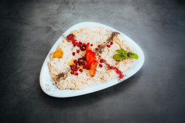 Baba Ganoush Garnished with Pomegranate and Mint