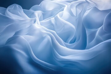 Obraz premium Flowing blue fabric creates soft waves reminiscent of serene water in an artistic composition of textile draping. Generative AI