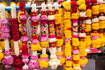 Fototapeta premium Flower garlands for sale, Buddism religious decorations in Thailand