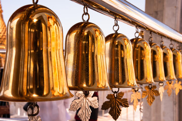 Golden bells in Buddhist temple in Bangkok, Thailand