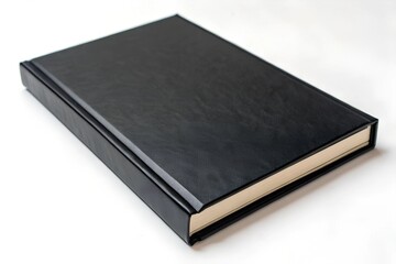 Obraz premium black leather notebook isolated