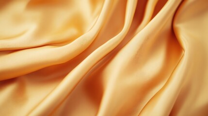 Fototapeta premium Flowing Golden Silk Fabric with Blurred Edges and Central Copy Space