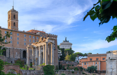 Rome cityscape, Italy: glimpse from Roman forum with Temple of Saturn.