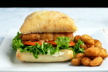 fish fillet sandwich,  with shrimp poppers
