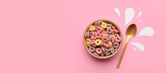 Bowl of colorful sweet cereal rings and paper milk drops on pink background with space for text, top view