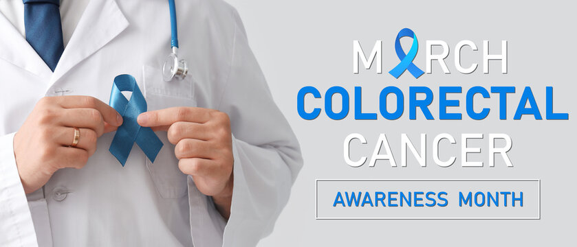 Male doctor with blue ribbon on light background, closeup. Prostate cancer awareness concept
