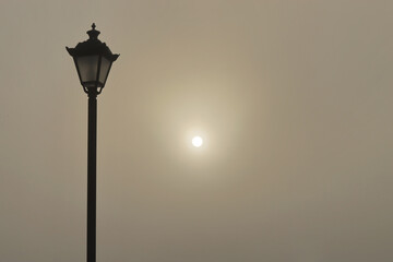 Street lamp on sky background