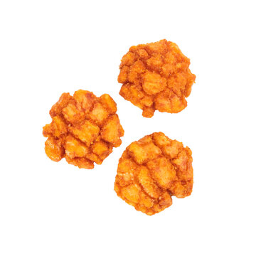 Three chili rice crackers placed on a white background. A crunchy and spicy snack option, perfect for a healthy and flavorful treat.
