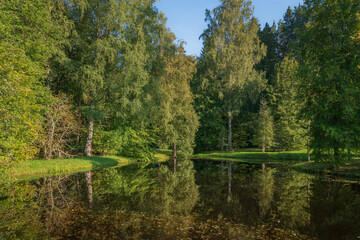 View of the pond with the island of solitude in the Mikhailovskoye Estate of the Pushkin...
