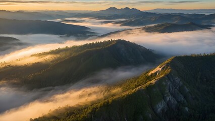 Golden Sunrise Over Misty Mountain Ranges
