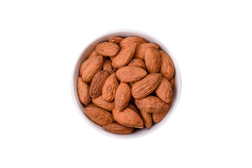 Delicious nutritious almond nuts in ceramic bowl