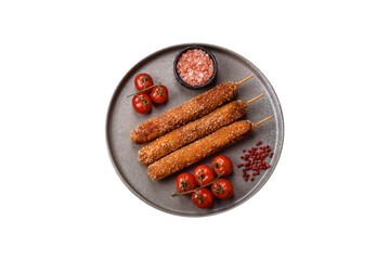 Lula kebab meat fried on a fire in breading with salt, spices and herbs