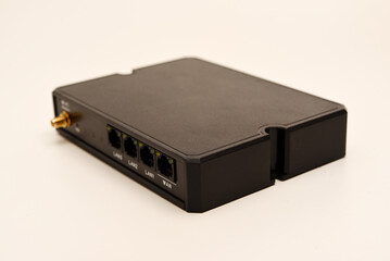 GSM modem. An Internet station with a SIM card. A black router on a white background.