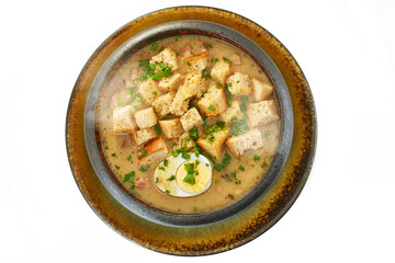 Polish quail soup with boiled egg, sausage and croutons. Healthy dish, organic food, White background.