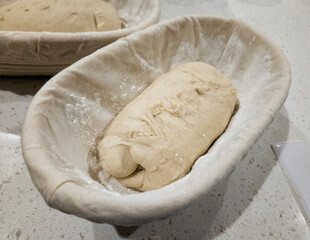 Bread dough in a banneton basket