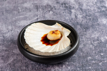 Tasty grilled scallops in a little bowl