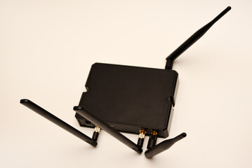 GSM modem. An Internet station with a SIM card. A black router on a white background.