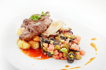 Long roast beef, noodles, olive tomato and caper salad, Polish cuisine, European food