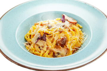 Delicious pasta with forest mushrooms, cream and parmesan Italian restaurant, background restaurant
