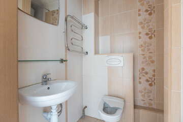 modern bathroom room with toilet and washing machine