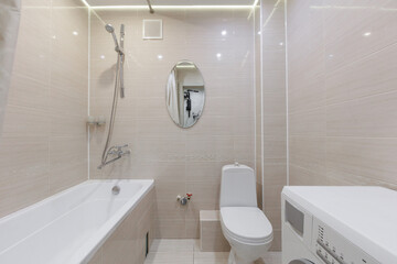 modern bathroom room with toilet and washing machine