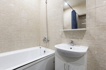 modern bathroom room with toilet and washing machine