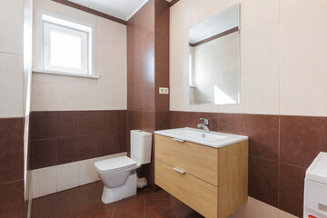 modern bathroom room with toilet and washing machine