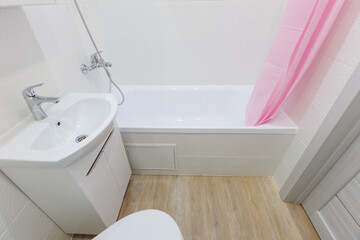 modern bathroom room with toilet and washing machine