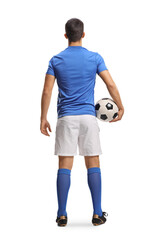 Rear view shot of a football player with a ball under arm
