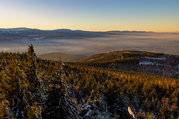 Sunset in the mountains. View of the Karkonosze Mountains from the Ostra Mala peak in Rudawy Janowickie