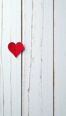 Rustic white wood backdrop featuring a solitary red heart , symbol, wood