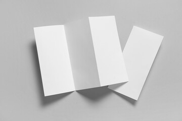 Blank brochures on grey background