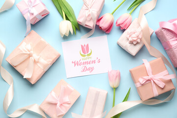 Festive postcard with gift boxes and tulips on blue background. Happy Women's Day