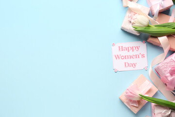 Festive postcard with gift boxes and tulips on blue background. Happy Women's Day