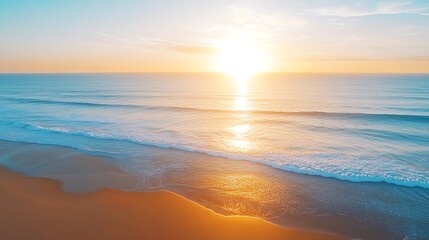 Breathtaking sunrise over a serene ocean. The golden sun reflects on the gentle waves, creating a peaceful and picturesque coastal view. Perfect for calming and inspiring visuals.