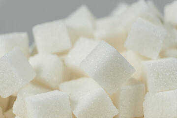 Cubes of white crystalline beetroot refined sugar.