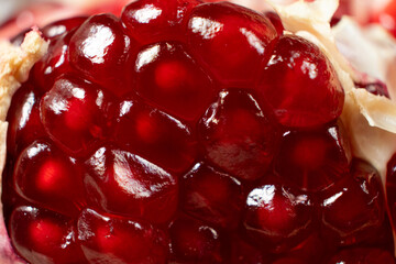 Pomegranate seeds in pomegranate, macro.