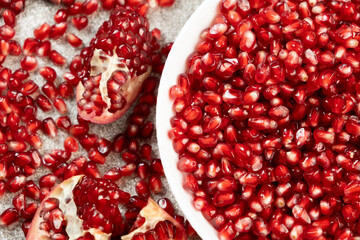 Ripe red pomegranate seeds close-up