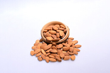 almonds, raw almonds, almond kernels, platefuls of almonds, nuts