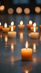 A single lit candle glows brightly, surrounded by softly glowing candles in a peaceful, dimly lit setting.