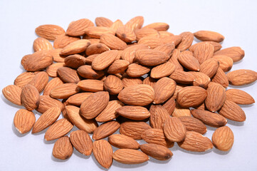 almonds, raw almonds, almond kernels, platefuls of almonds, nuts