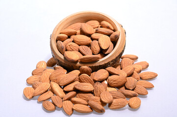 almonds, raw almonds, almond kernels, platefuls of almonds, nuts