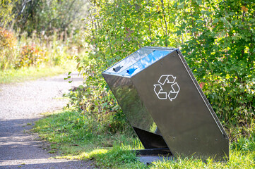 Brown Recycling Bin for Trash and Recycling Along Nature Walking Path