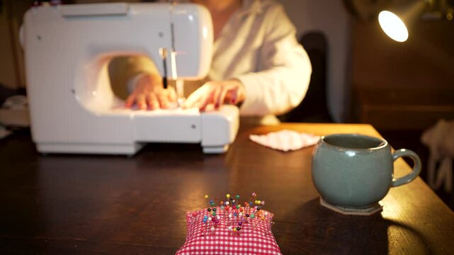 Home Clothes Repair Using Sewing Machine, Selective Focus On Pin Cusion