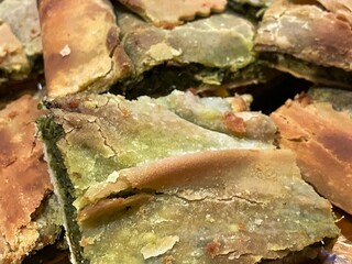 Cut pieces of erbazzone reggiano - Italian food of Emilia Romagna